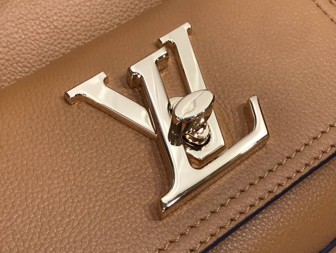 L0vis Vvtt0n Lockme Replica Bucket Bag Orange M57688