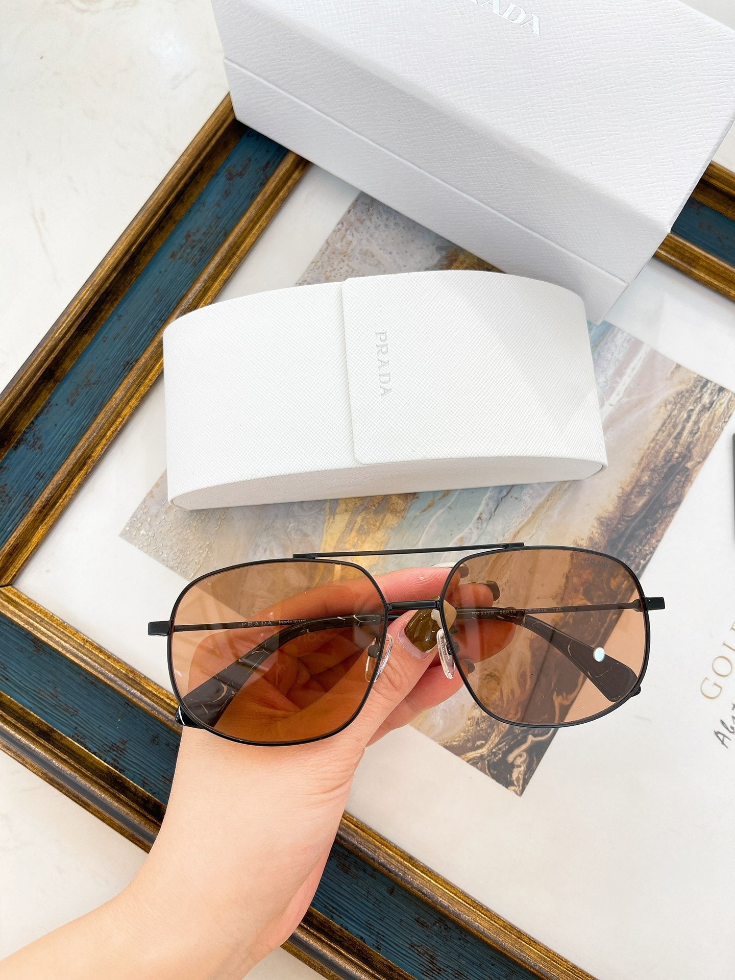 Pra*a Sunglasses